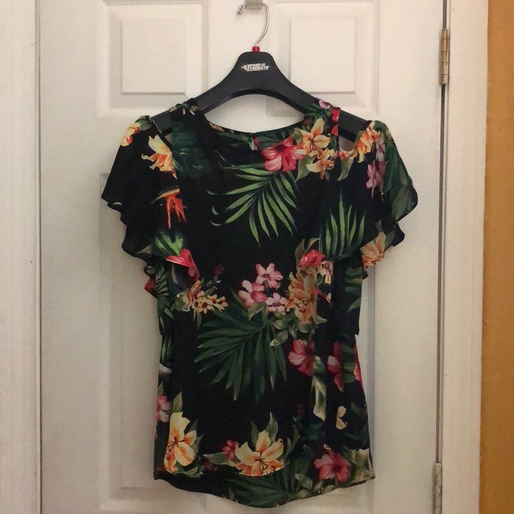Cap sleeve flower print top with open shoulders.
